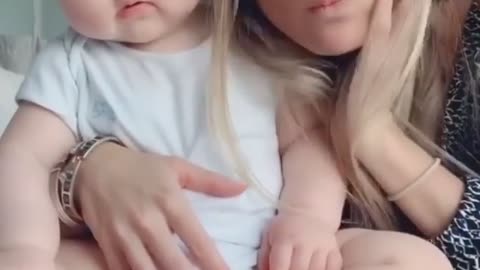 Baby's reaction when her mother pranks on her for eating legs