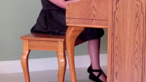 Playing at piano recital