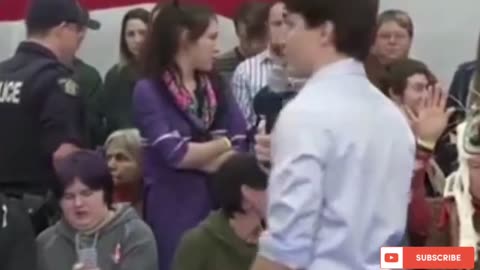 Trudeau physically removes and arrests town hall audience members when they stand up to him.