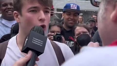 Man argues with a Trump supporter about his arrest