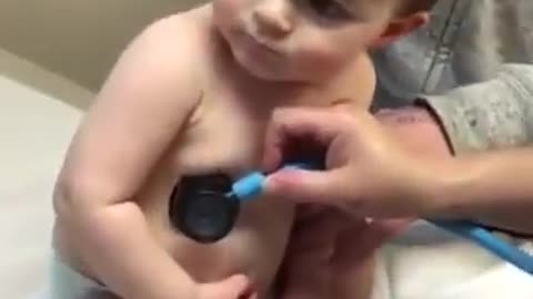 The sweet little boy, reclines his head in the nurse's hand, how cute! Hilarious people Memes-66