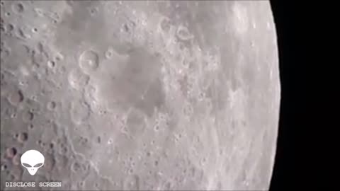 UFO seen casting a shadow on the Moons surface.