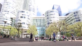 People Walking In Streets Morning In Front Of Tech Company