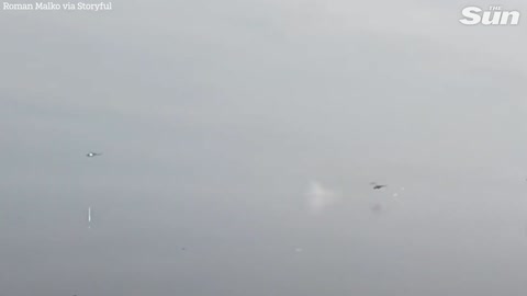 MOMENT 'RUSSIAN' Helicopter IS SHOT DOWN OVER RESERVOIR NEAR KYIV