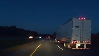 Flaming Tire Crosses Median and Clips Semi