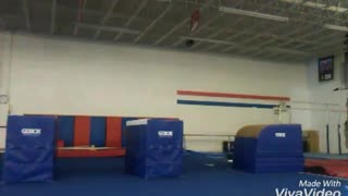 Gymnastics jump into blue block