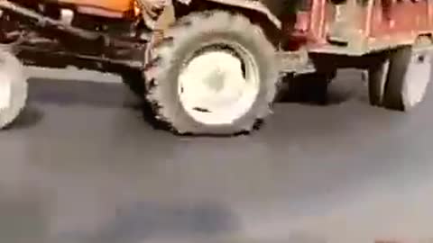 Funny video people falling off from a speeding tractor
