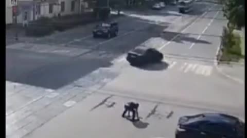 Two men FIGHTING to fix manhole cover