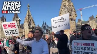 Protestors chant leave our kids alone at Parliament Hill in Ottawa at the 1 Million March 4 Children