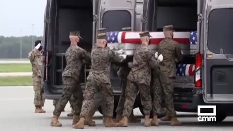 13 U.S. soldiers killed in bombing at the Kabul airport arrive at Dover Air Force Base in coffins.