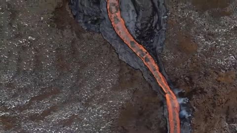 Aerial photos show the lava flow from a new volcanic fissure near Reykjavik