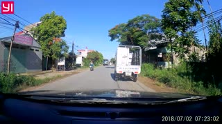 Close Call on Scooter Between Two Vehicles