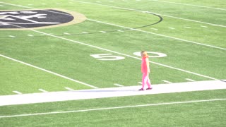 10 Year old Jackie does Cartwheel gymnastics on Football Field