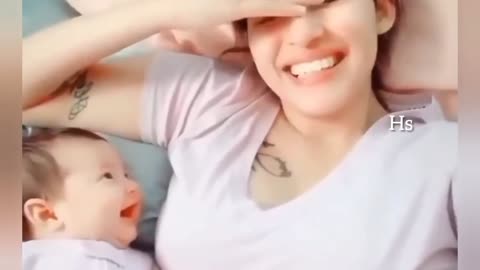 adorable baby Looking at her mom😃