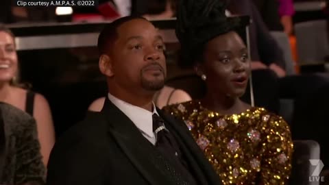 Watch the uncensored moment Will Smith smacks Chris Rock on stage at the Oscars, drops F-bomb