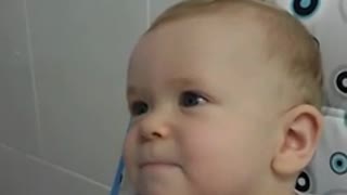 Cute baby makes funny sounds