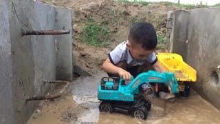 Children Playing Excavator Loads Dump Truck