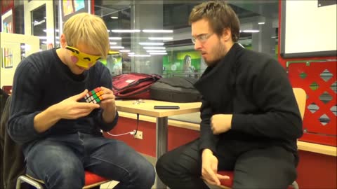 Blindfolded teamwork leads to solved Rubik's Cube