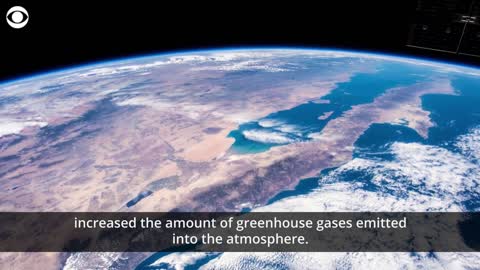 What are greenhouse gases and how do they contribute to climate change?