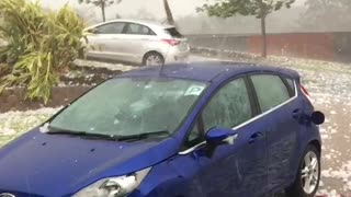 Surprise Hail Storm Smashes Car in Seconds