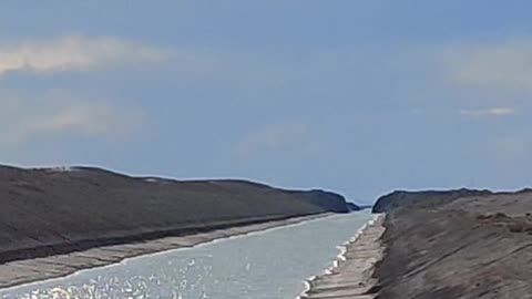 Great Salt Lake West Desert Pump Canals - Water flowing into the heat of the west desert