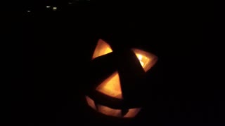 Make a pumpkin scarecrow