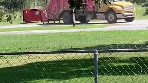 Dump Truck Drives Off with Dumpster