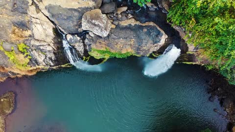 Beauty of Nature - a waterfalls cascading from a mountain cliff