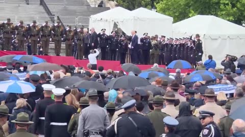 Biden trips again 🤣 during his entrance at the national Peace Officers Memorial Service.