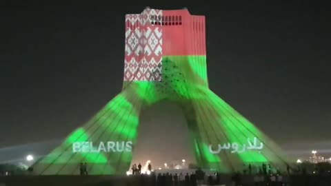 Tehran, Iran lights up the Azadi Tower in the Belarusian flag to celebrate Independence Day.