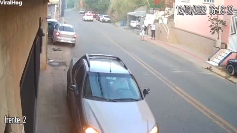 Pedestrians Narrowly Escape Being Hit by Car