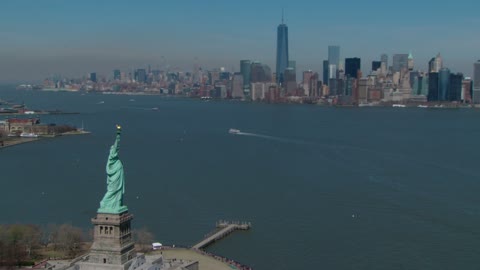 statue-of-liberty-with-nyc-skyline