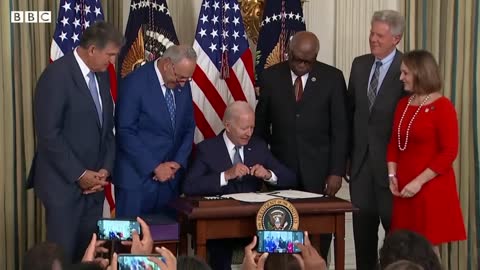 US President Joe Biden signs climate, tax and health bill into law