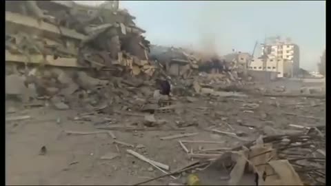 "Devastation in Gaza: Al Zahraa Residential Towers Destroyed by Israeli Airstrikes"