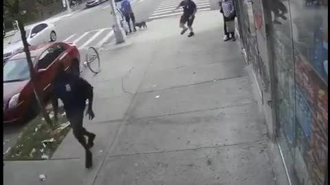 Guy knocks an elder, gets chased by civilians and arrested.