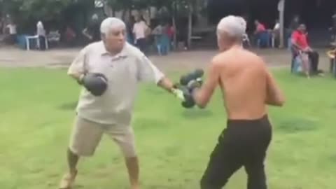 two drunk old men fighting