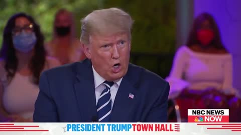 Everyone Is Going Nuts Over the "Nodding Woman" Behind Trump at Town Hall