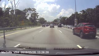 Motorcycle Carelessly Weaving Through Traffic Pays the Price