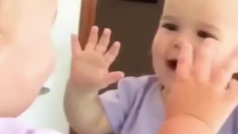 baby reaction to seeing himself in the miiror