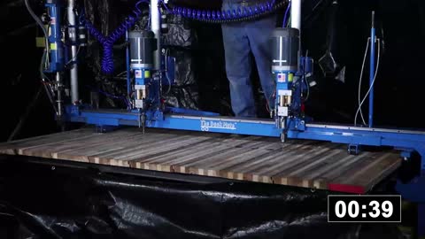 The DeckMate truck and trailer bed drilling and screw driving system