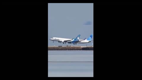 Two planes landing side by side on a runway | Amazing video of planes landing