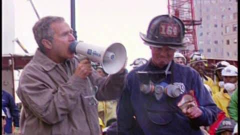 Bush's iconic Ground Zero speech atop of rubble alongside firemen