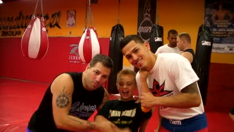 My son posing with Anthony Pettis and his coach Duke Roufus