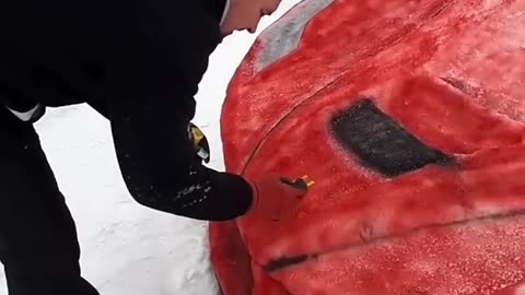 He made a Ferrari out of snow 😱