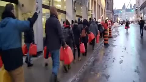 Canadians Carry Empty Jerry Cans Through Ottawa Streets