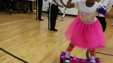 Wow, Little girl shows off hoverboard dance moves,..