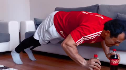 Push ups with bottles coca-cola