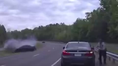Cop Barely Escapes High-Speed Car Crash