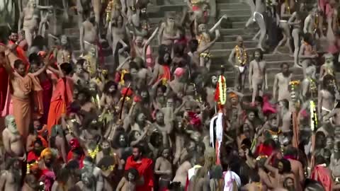 Devotees take holy plunge in Ganges amid pandemic