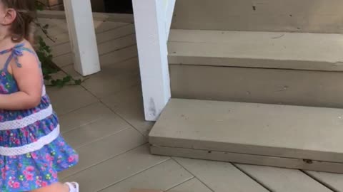 Toddler thinks she's jumping off the stairs